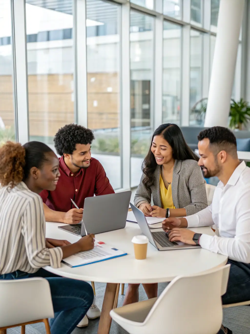 A group of diverse business professionals engaged in a lively discussion around a conference table, symbolizing Corporate Leadership English.